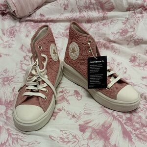 Pink lace high top converse